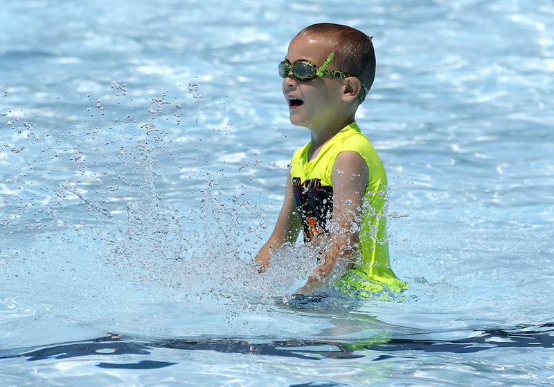Aaron Appel, 6, plays in the water while swimming on Friday, June 21, 2024, at Woodstock Water Works.