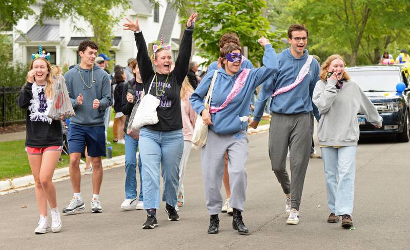 Lyons Township High School Operation Snowball members bring their enthusiasm to the annual homecoming parade on Saturday, Sept. 24, 2022.