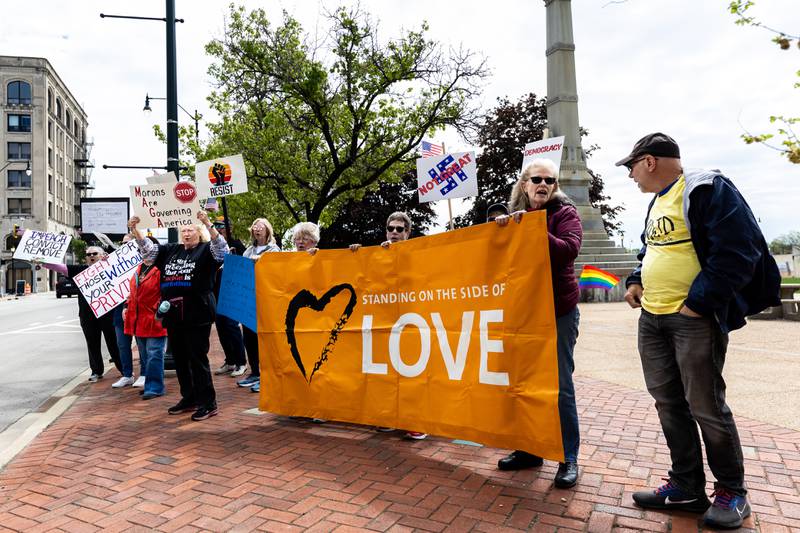 Attendees line Jefferson Street in Downtown Joliet during the May Day Weekend Rally on May 3, 2025.
