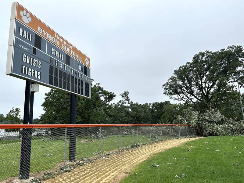 The outfield fence around Byron High School's varsity softball field was damaged during Monday's storm. Crews were busy on Tuesday, July 16, 2024 clearing the debris and surveying the damage.