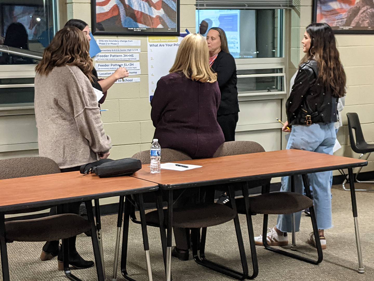 Dist. 308 community members participate in an exercise during a discussion about student assignment and enrollment growth as part of a public forum at Plank Junior High School Monday, Nov. 3, 2025.