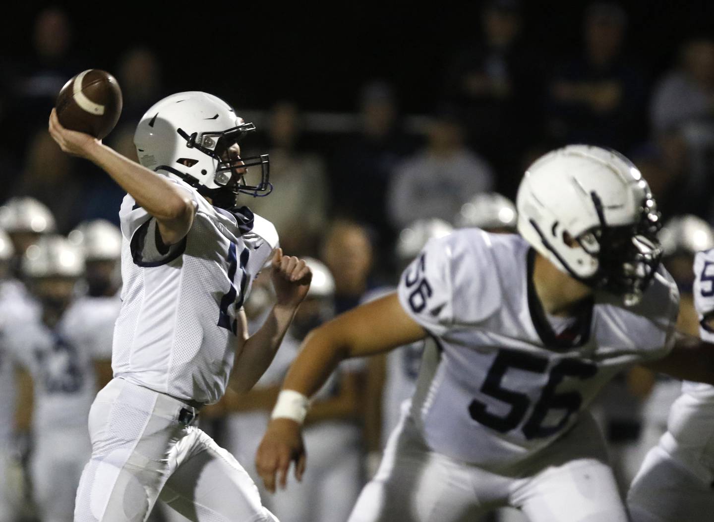 Cary-Grove's Payton Seaburg throws a touchdown pass during a Fox Valley Conference football game between Prairie Ridge  and Cary-Grove Friday, Sept. 23, 2022, at Prairie Ridge High School in Crystal Lake.