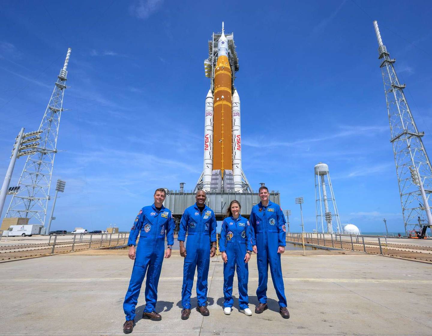 NASA astronauts, from left, Reid Wiseman, Victor Glover and Christina Koch and Canadian Space Agency astronaut Jeremy Hansen visit the Artemis II launch system Monday, March 31, 2026, at the Kennedy Space Center ahead of the scheduled launch.