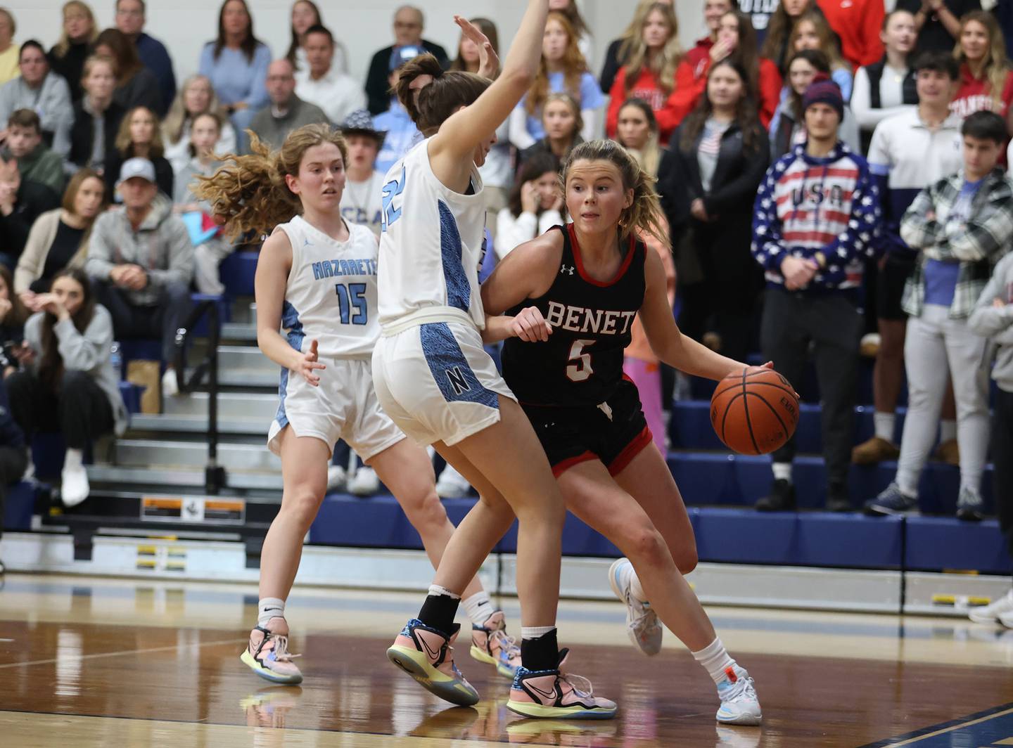 Benet's Lenee Beaumont (5) drives the baseline during the girls varsity basketball game between Benet and Nazareth academies on Wednesday, Jan. 3, 2023 in La Grange Park, IL.