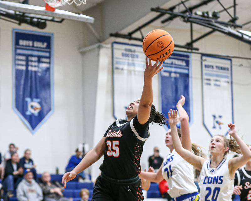 Saint Charles East's Corinne Reed (35) puts up a left-handed shot during their Coach Kipp's Hoopfest basketball game between Lyons at St Charles East. Jan 18, 2025 in La Grange.