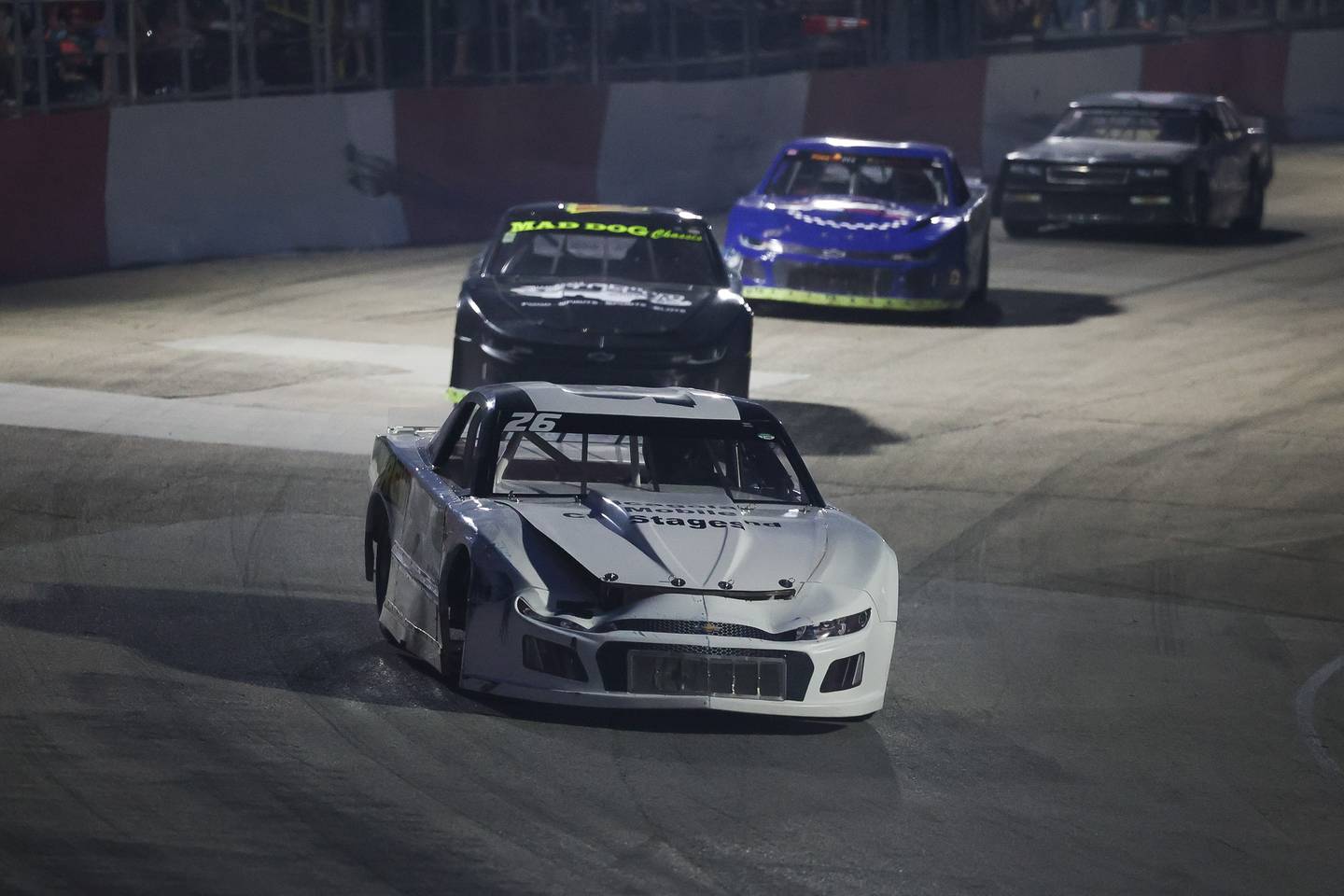 Chad Bayuk holds a lead in the Street Stock feature race on a special fundraising night for the Special Olympics at Grundy County Speedway on June 15, 2024 in Morris.