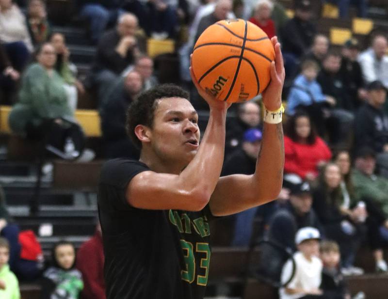Crystal Lake South’s Cooper Buelna takes a shot against Grayslake Central during Hinkle Holiday Classic varsity boys basketball tournament action on Thursday, Dec. 26, 2024 at Jacobs High School in Algonquin.