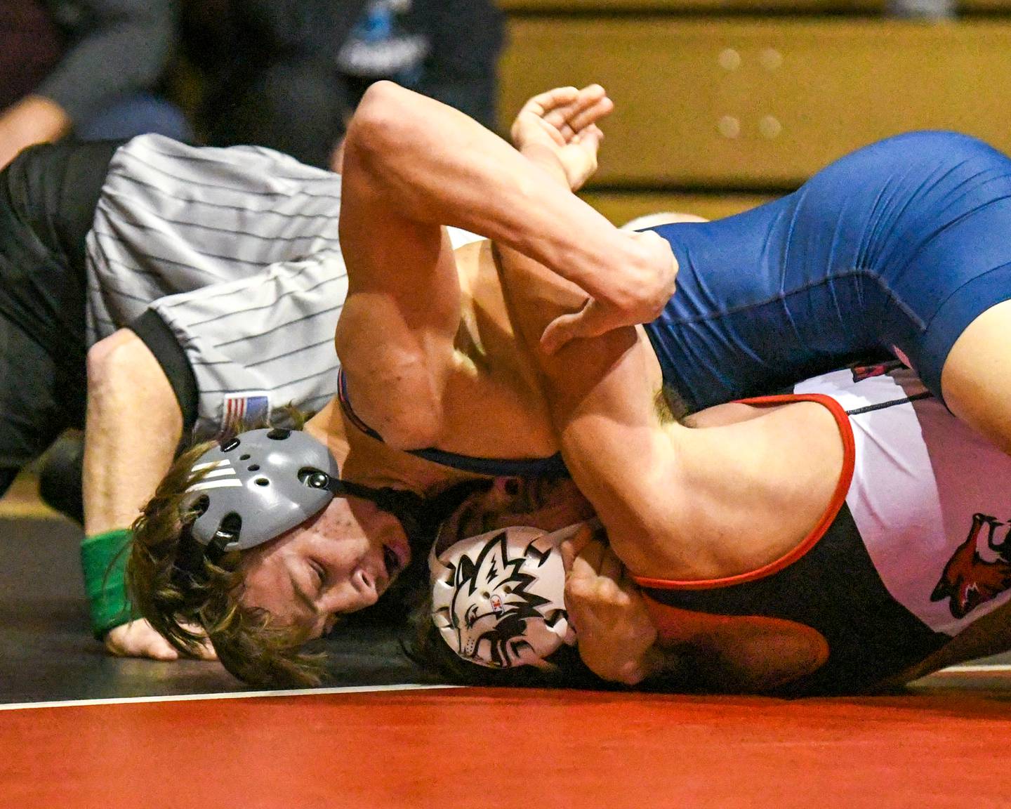 Oswego's Brayden Swanson, top, gets the pin against Yorkville's Dominic Recchia during the 144-weight class match up on Thursday Dec. 19, 2024, held at Yorkville Freshman Center.