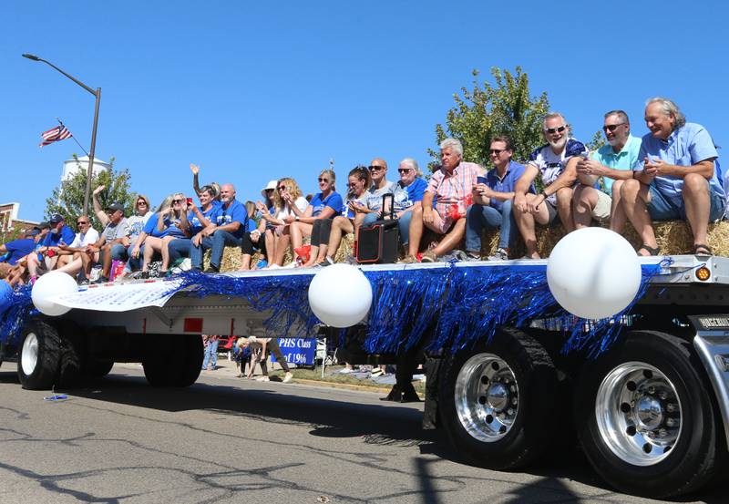 The Princeton High School class of 1983 rides on float during the 52nd annual Homestead Festival parade on Saturday, Sept. 9, 2023 in Princeton.