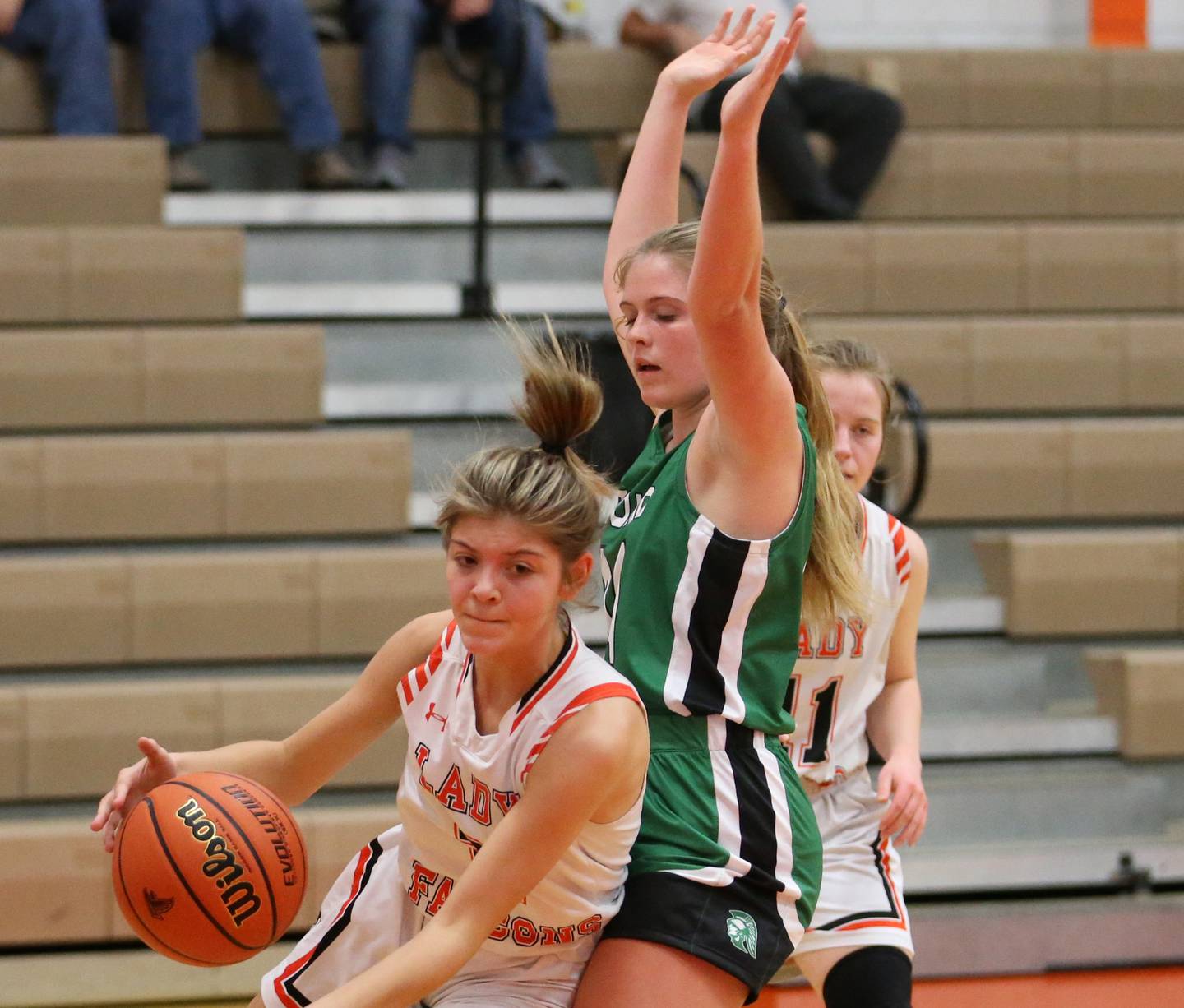 Flanagan-Cornell Woodland's Emme Wallace (2) looks to run past Dwight's Amelia Ulrich (14) in the Integrated Seed Lady Falcon Basketball Classic tournament on Thursday, Nov. 17, 2022 in Flanagan.