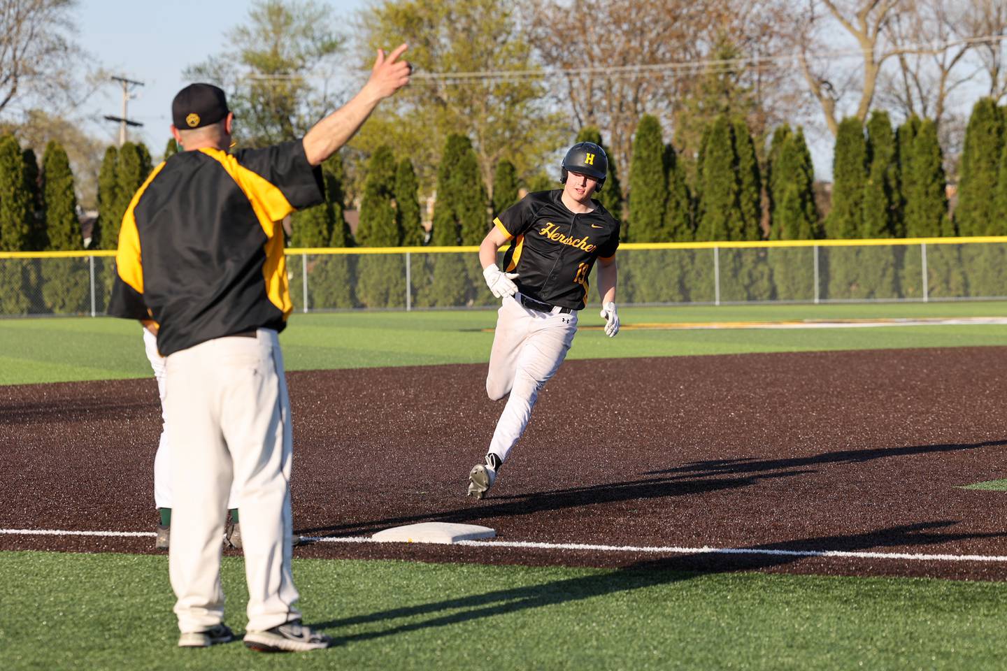 Herscher's Reed Laird rounds third base during the Tigers' 21-0 victory over Grant Park on Wednesday, April 23, 2025.