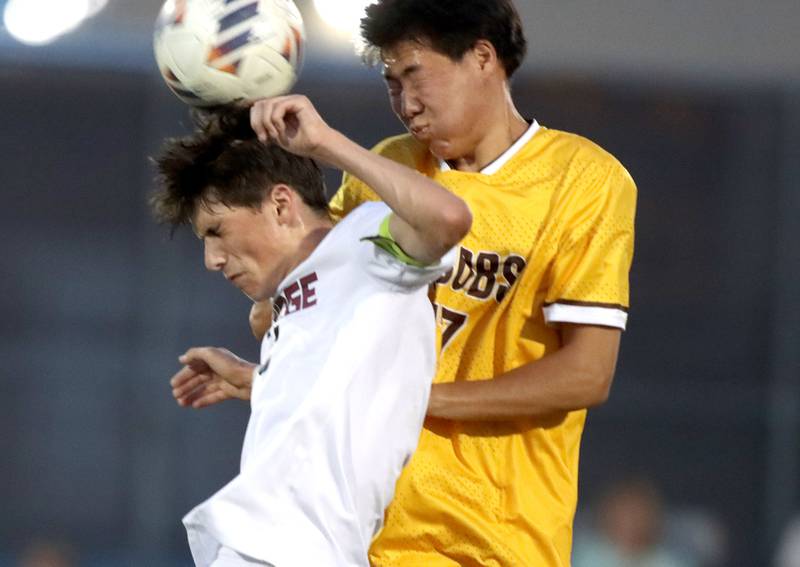 Jacobs’  Elnur Kaziev, right, battles Prairie Ridge’s Trenton Pavoris in varsity soccer at Jacobs High School in Algonquin on Thursday, Sept. 18, 2025.