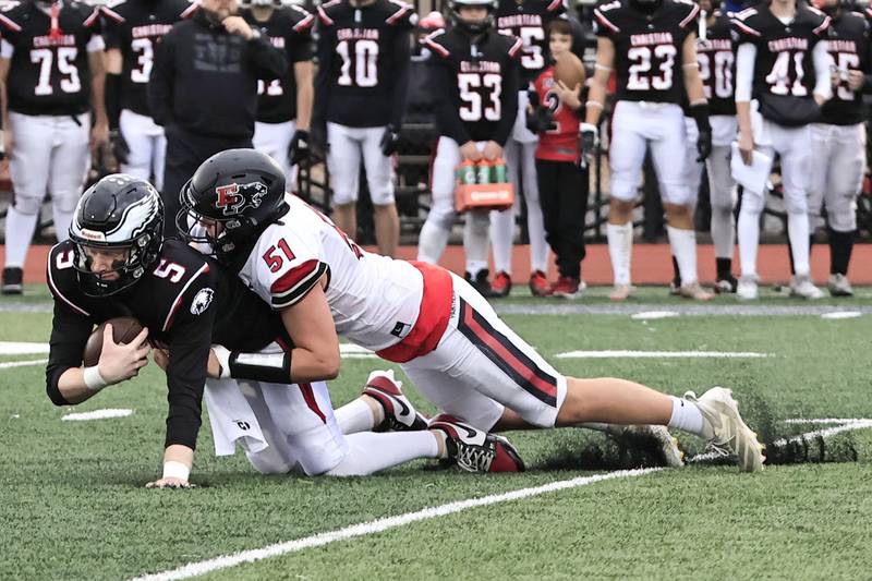 EP’s Derek Naftzger sacks on Aurora Christian’s Asa Johnson Saturday, Nov. 1, 2025 in Aurora. The Panthers ended their season Saturday after losing to the Eagles 37-12