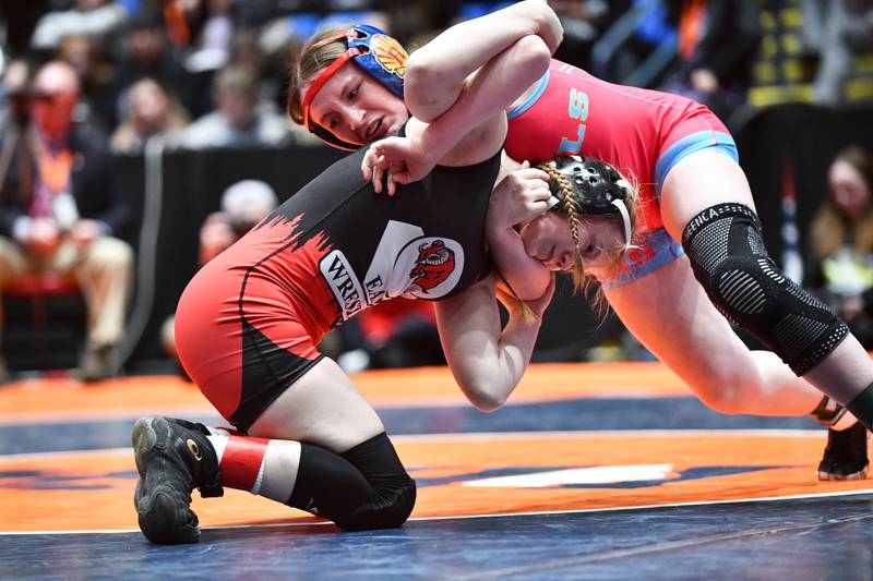 Nadiia Shymkiv of Glenbard East, left, wrestles in the 105-pound championship match in the IHSA Girls Individual State Finals on Saturday, March 1. Shymkiv took second to Chloe Skiles of Roxana.