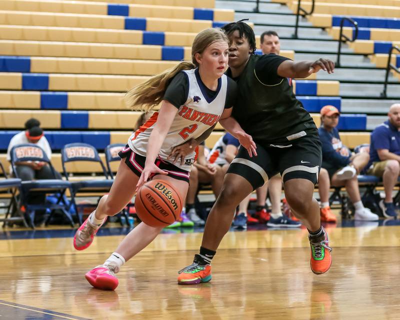 Oswego's Ashley Cook drives baseline at the Oswego girls basketball shootout tournament. June 28, 2024.