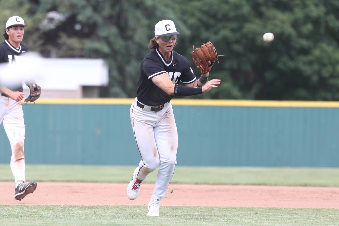 Lincoln-Way Central’s Landon Mensik makes a throw to first for the out against Lincoln-Way West in the Class 4A Providence Sectional semifinal on Wednesday, May 29, 2024 in New Lenox.