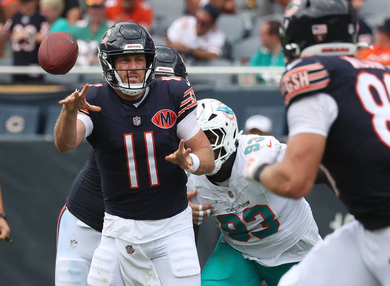 Chicago Bears quarterback Case Keenum throws a pass to tight end Joel Wilson Sunday, Aug. 10, 2025, during their game against the Miami Dolphins at Soldier Field in Chicago.