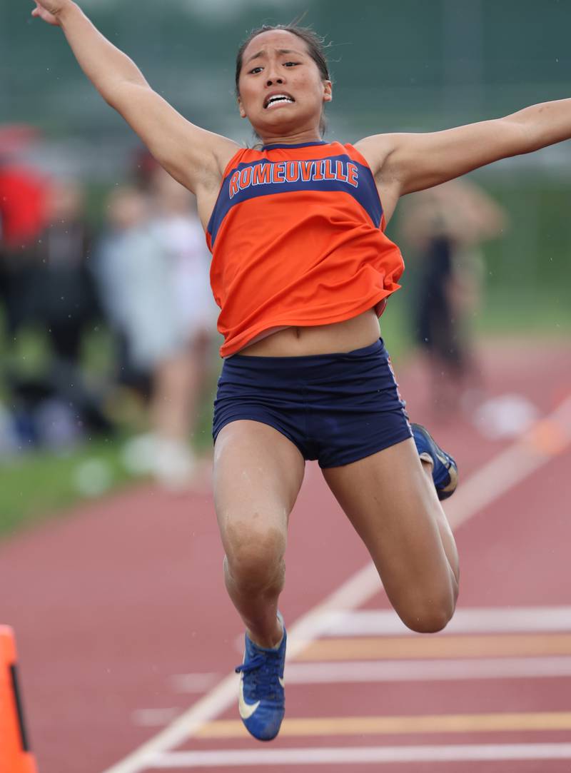 Romeoville's Ava Maglaya participates in the long jump during the girls varsity track and field 3A Lockport sectional on Friday, May 12, 2023.
