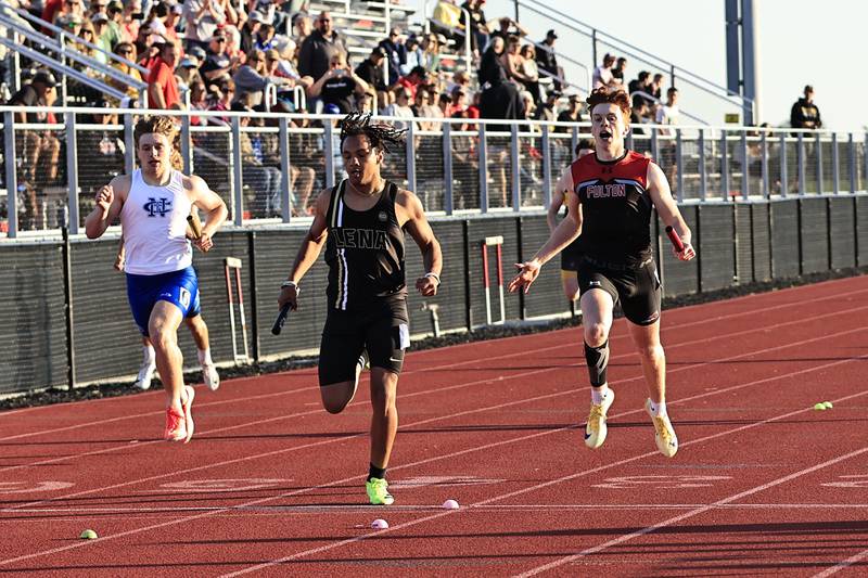 Wednesday evening brought close competition in Erie at the IHSA sectional track meet. Here in the 4 x 200 relay race, Lena Winslow finished 2nd with a time of 1:31.37, Fulton in 3rd with a time of 1:31.54, and 4th went to Newman Central Catholic with a time of 1:31.94, Morrison took first with a time of 1:27.54