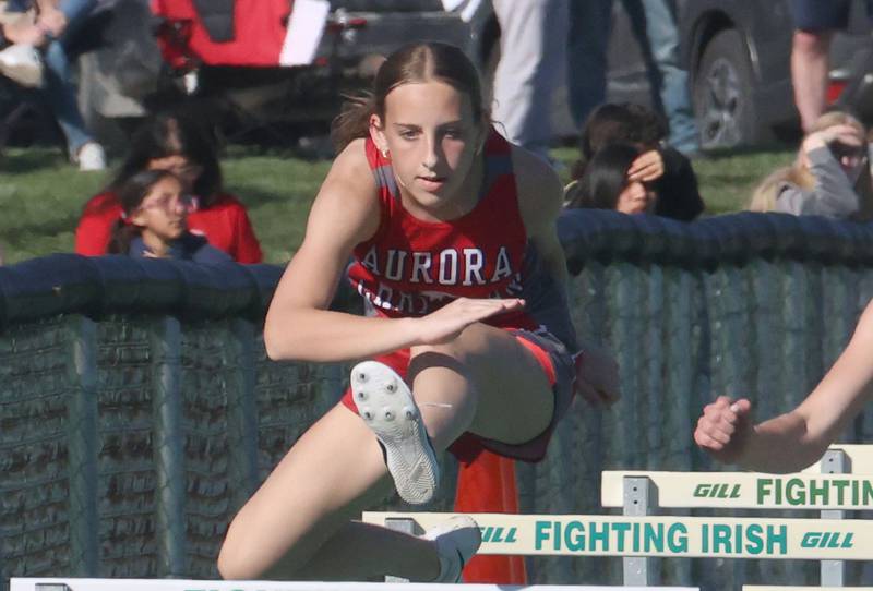 Aurora Christian's Kaylee Becvar competes in the 100 meter hurdles during the Class 1A Sectional meet on Thursday, May 14, 2026 at Seneca High School.