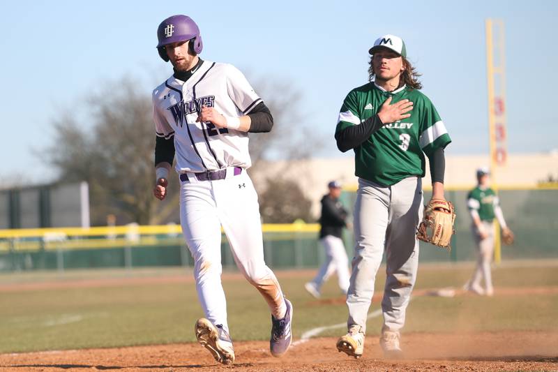 Moraine Valley’s Nate Pacetti takes responsibility for a wild pitch that scored Joliet Junior College’s Brendan Sturm on Tuesday, March 7th, 2023.