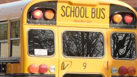 School bus crashes into utility pole in Kingston, causes brief fire