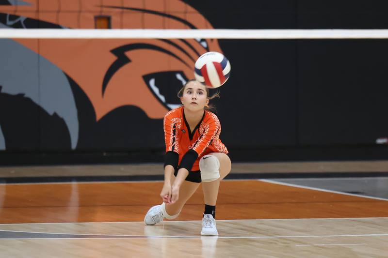 Beecher's Liliana Irwin volleys a serve during the Bobcats' victory in two sets, 25-22, 25-23, over Grant Park in the RVC championship game on Monday, Oct. 20, 2025, at Beecher High School.