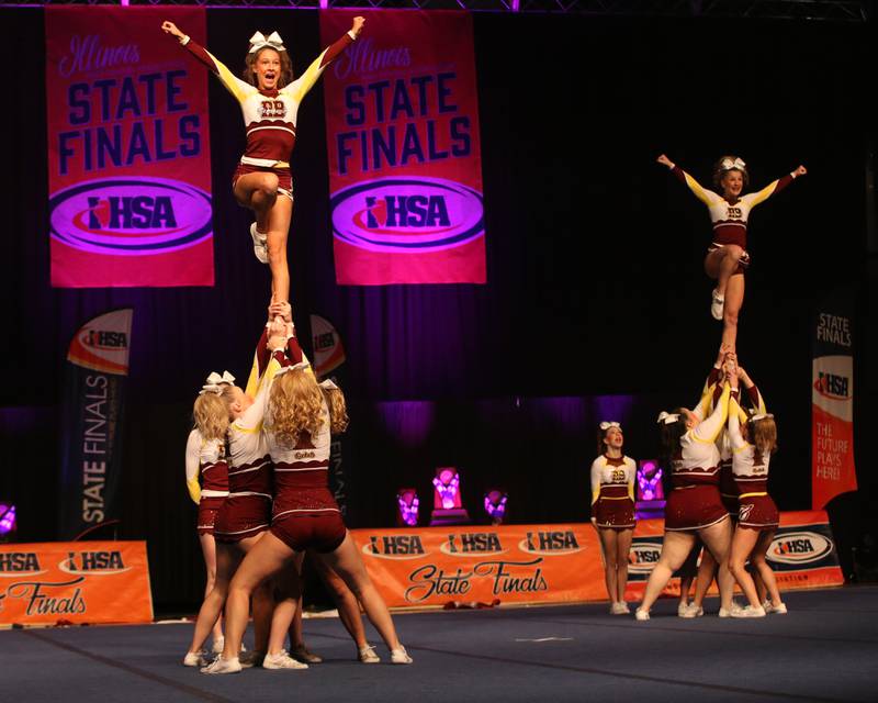 Members of the Richmond-Burton cheer team perform during the IHSA Cheer State Finals in Grossinger Motors Arena on Saturday, Feb. 4, 2023 in Bloomington.