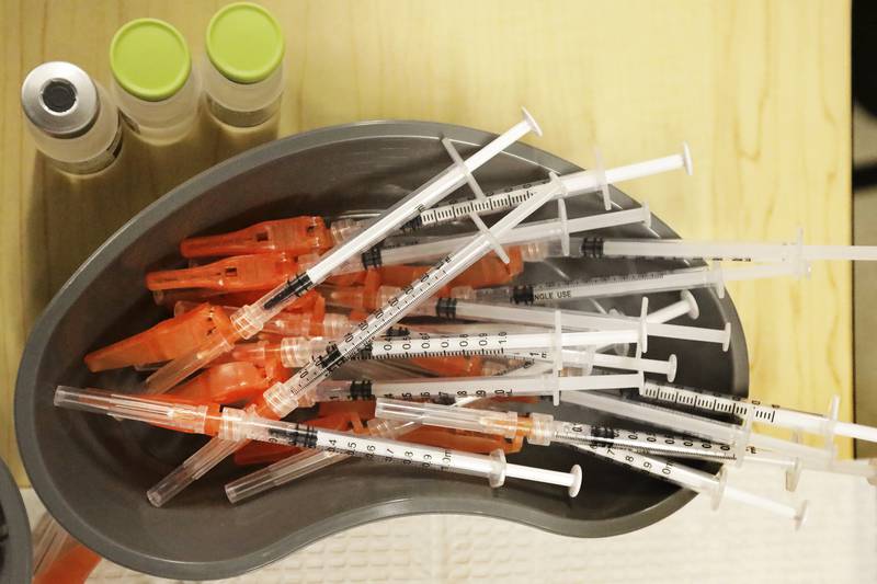 FILE - Pre-loaded syringes with COVID-19 vaccine are ready for use in New Orleans, on Jan. 25, 2022. The COVID-19 vaccines are on track for a big recipe change this fall.  Scientific advisers for the Food and Drug Administration on Thursday, June 15, 2023, discussed whether the next round of shots should only include protection against the newest omicron strains that are now dominant worldwide.  (AP Photo/Ted Jackson, File)