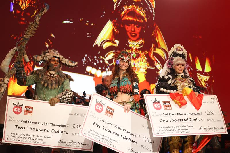 2023 Cosplay Central Global Crown Championship winners Cosplayer Ludus Cosplay (left), Cosplayer Nerds Gone Mild Cosplay and Cosplayer Alisyuon stand on the stage to close out the night at C2E2 Chicago Comic & Entertainment Expo on Saturday, April 1, 2023 at McCormick Place in Chicago.