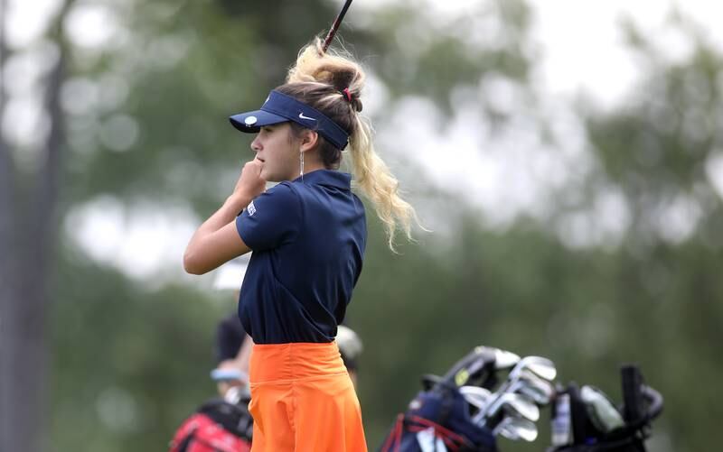 Naperville North’s Georgia Riley tees off during the Class 2A Glenbard North Regional girls golf meet at Bloomingdale Golf Club on Thursday, Sept. 28, 2023.