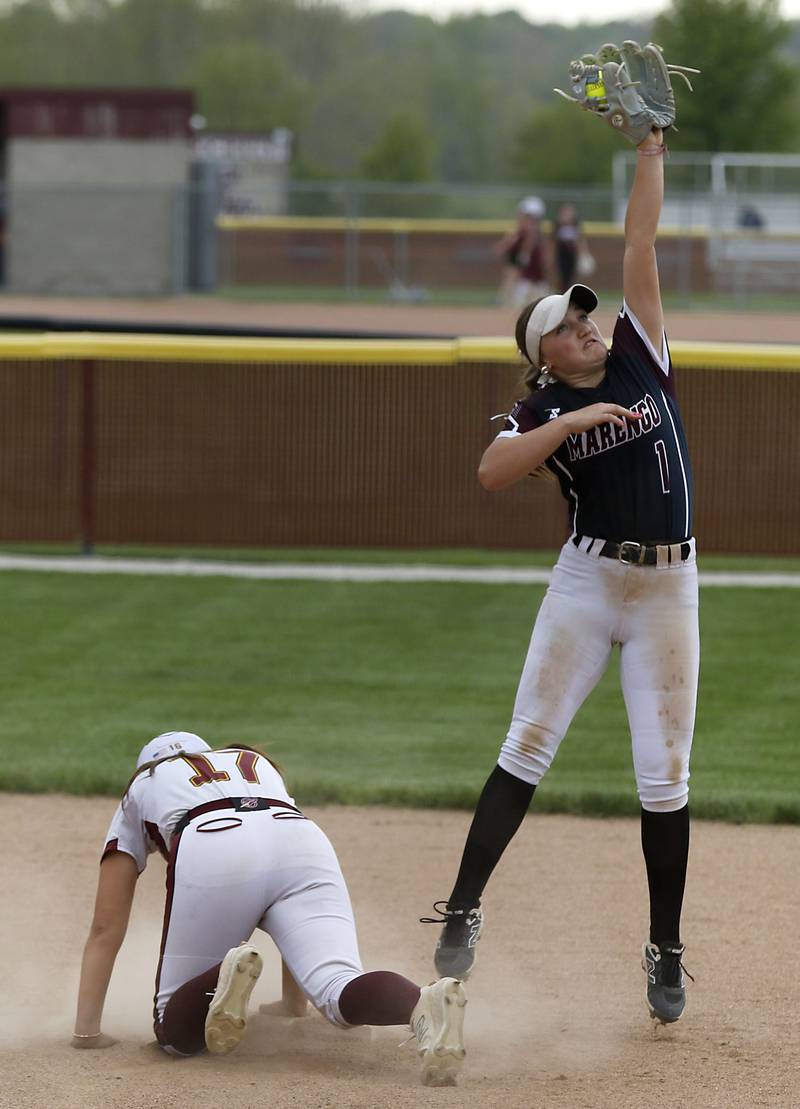 Richmond-Burton's Gabby Hird is safe at second base as Marengo's Gabby Christopher catches the throw from the outfield during a Kishwaukee River Conference softball game on Monday, May 12, 2025, at Richmond-Burton High School in Richmond.
