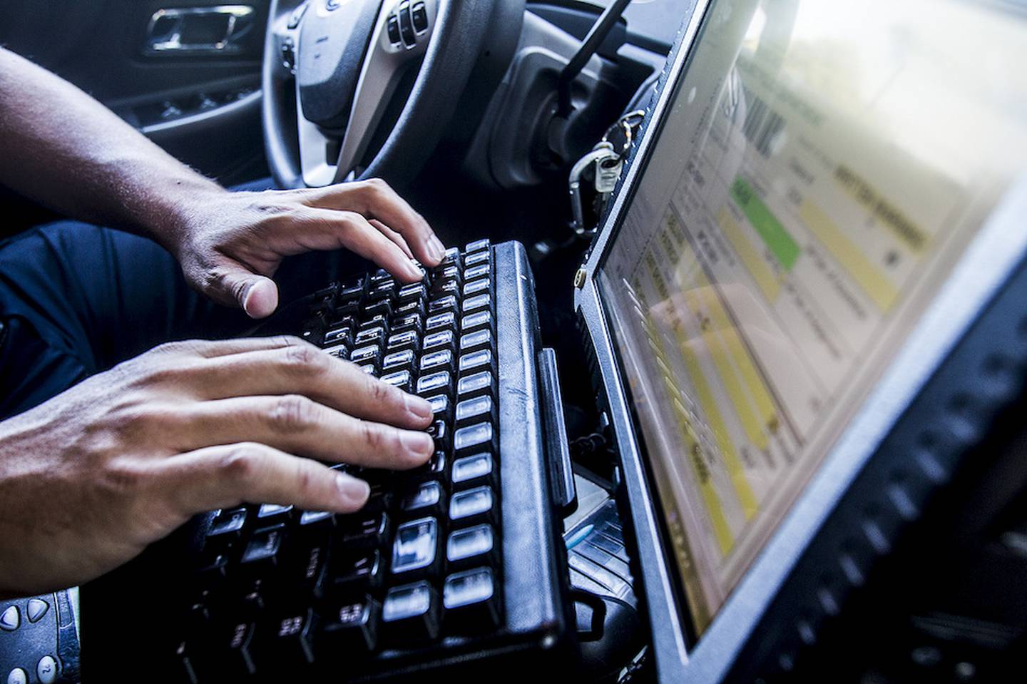 McHenry police officer Ryan Gregorio types out a warning for a speeding violation. The McHenry Police Department uses points of contact to track how effective employees are and whether they're doing their jobs, McHenry Police Chief John Jones said – adding that issuing a warning can be just as effective as writing a ticket in correcting behavior.