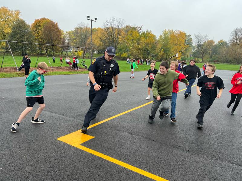 Mendota police officers, along with firefighters, participated in kickball games Friday, Oct. 27, 2023, at Northbrook and Lincoln schools with students.