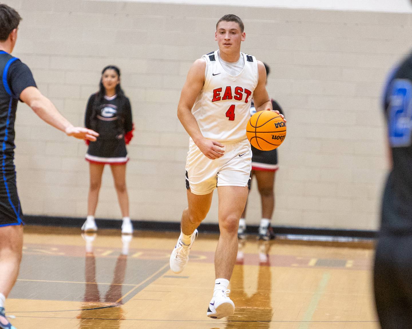 Glenbard East's Michael Nee dribbles the ball up court against St. Charles North on Tuesday Dec.2,2025 in Lombard.