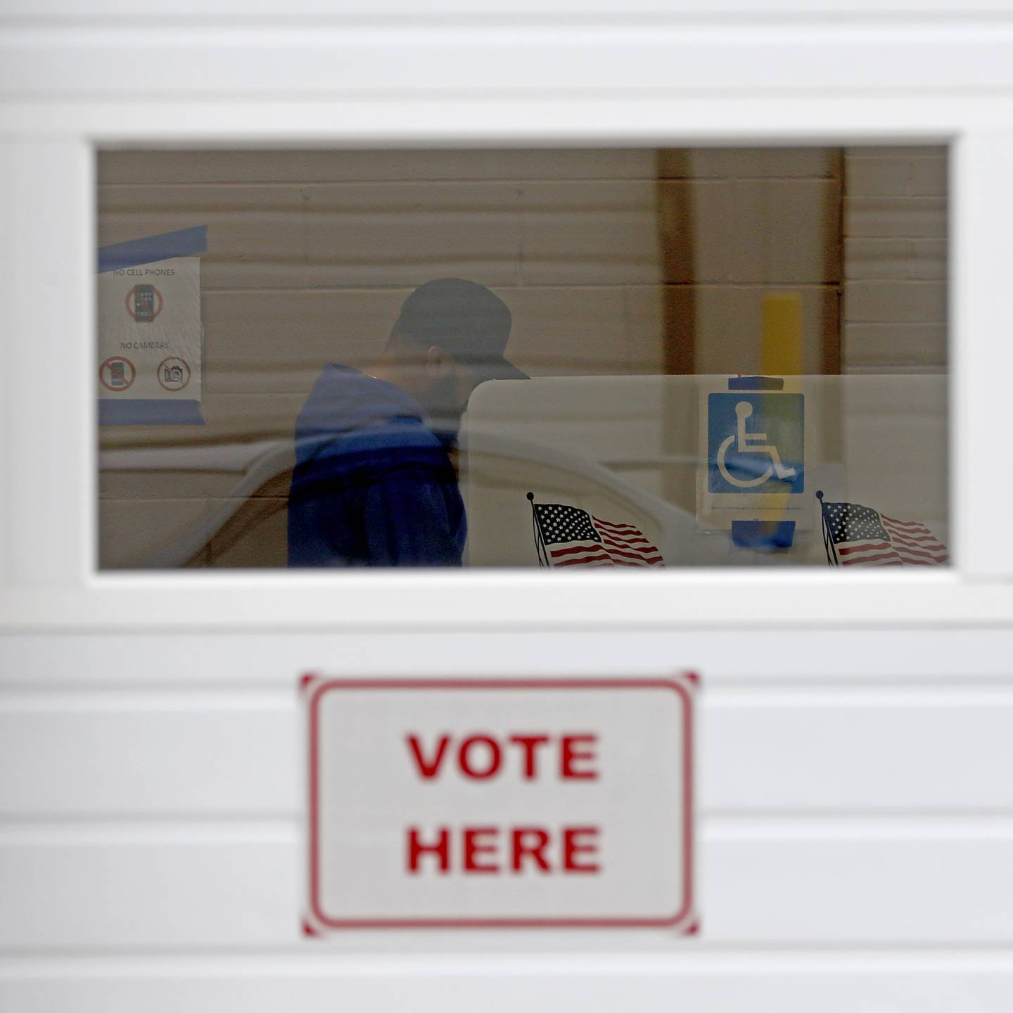 A voter votes on Monday, Nov. 4, 2024, at the Algonquin Township Office at 3702 US Hwy 14, in Crystal Lake.
