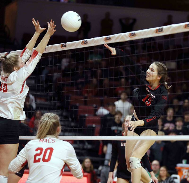 Benet’s Kirsten Krammer (15) pushes the ball over the net during the IHSA Class 4A girls volleyball state title game between Benet Academy and Mother McAuley Saturday November 12, 2022 at Redbird Arena in Normal.