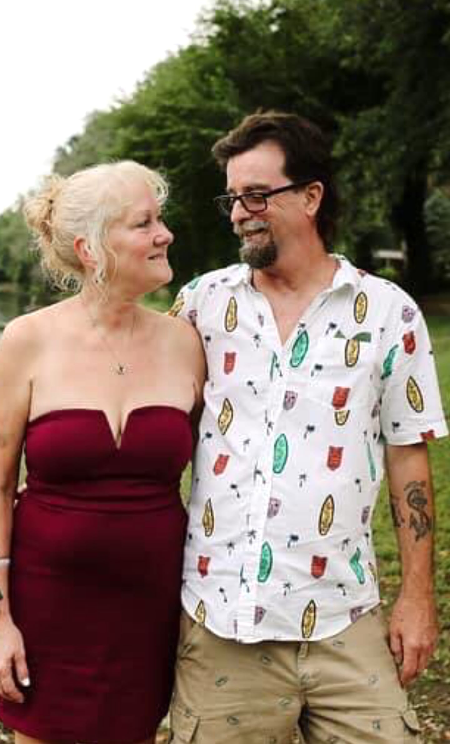 Sue Antonelli and her late partner Joe Tallman pose for a photo during a family backyard wedding at their Sandbar Road home in Aroma Township.