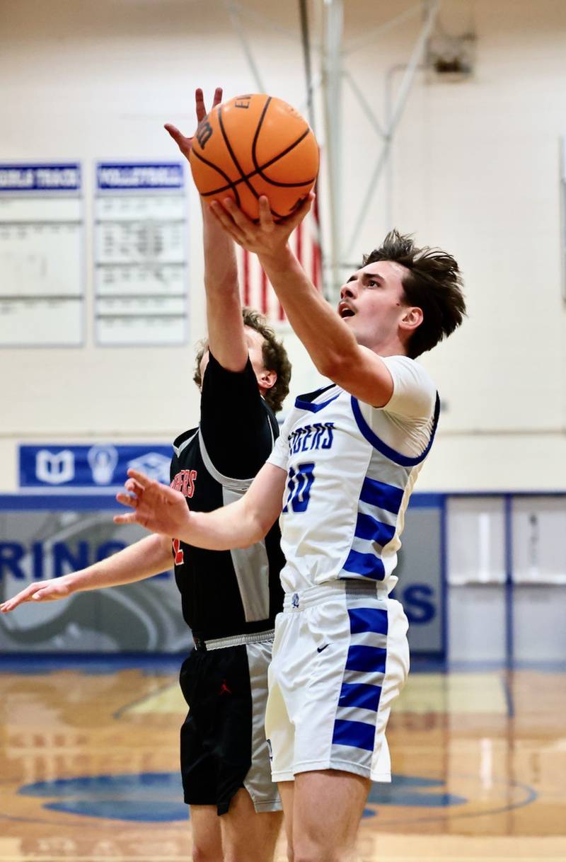 Princeton senior Gavin Lanham takes in a layup against Erie-Prophetstown in Tuesday's game at Prouty Gym. The visiting Panthers won 54-46.