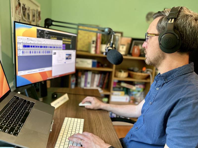 Richard Clark, owner of Area Code Audio working from his home studio in Batavia.
