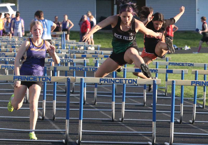 Mendota's Eden Pecher and Rock Falls's Emma Rumley compete in the 110 meter hurdles during the Ferris Invitational on Monday, April 15, 2024 at Princeton High School.