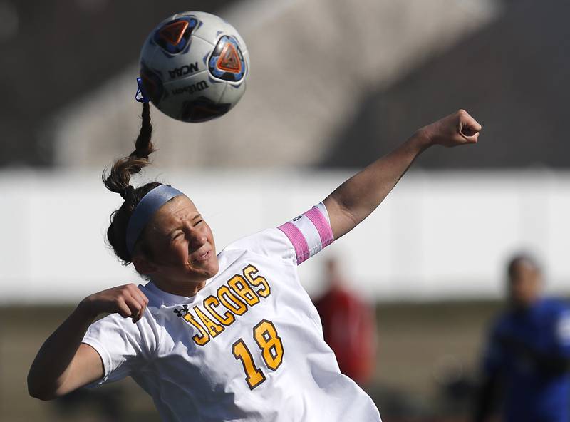 Jacobs' Delaney Roimiser heads the ball during a nonconference Huntley Invite girls soccer match against Larkin Tuesday, March 28, 2023, at Huntley High School.