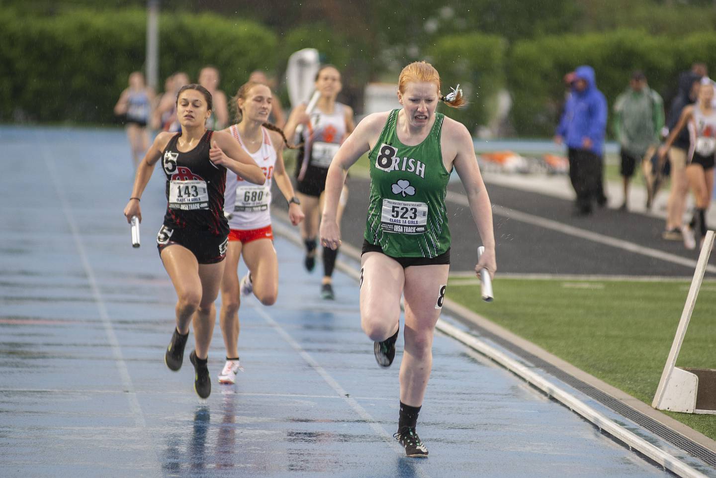 Seneca's Emma Smith leans across the finish to complete the Irish's championship of the 1A 4x400 finals during the IHSA girls state championships, Saturday, May 21, 2022 in Charleston.