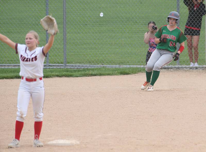 L-P's Mackenzie Chamberlain rounds first base as Ottawa's Rylee Harsted waits for the cut off throw on Wednesday, May 7, 2025 at Ottawa High School.