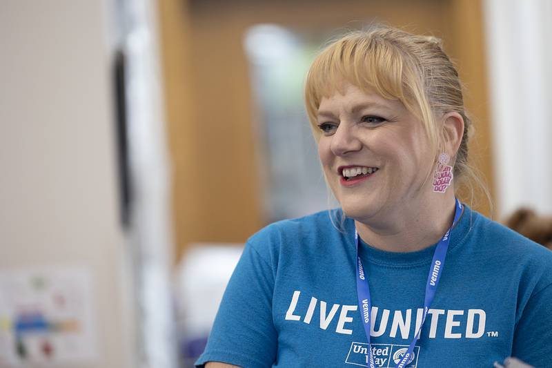 United Way of Whiteside County board member Dawn Costello talks about Dolly’s Book Bash Wednesday, June 25, 2025, in Morrison. The United Way sponsored the event  as part of Dolly Parton’s Imagination Library which supports the transformative power of reading.