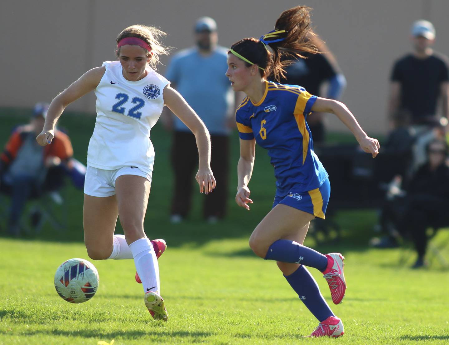 Johnsburg’s Liz Smith, right, battles Woodstock’s Haley Dix in varsity soccer on Wednesday, April 23, 2025, at Johnsburg High School in Johnsburg.