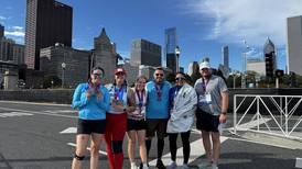 Police from around Grundy County participate in the Chicago Marathon