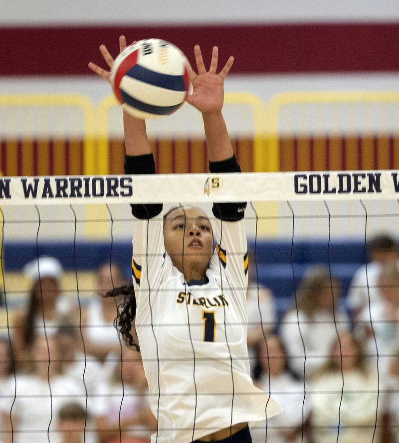 Sterling’s Nia Harris goes up for the block Tuesday, Sept. 10, 2024, against Moline.