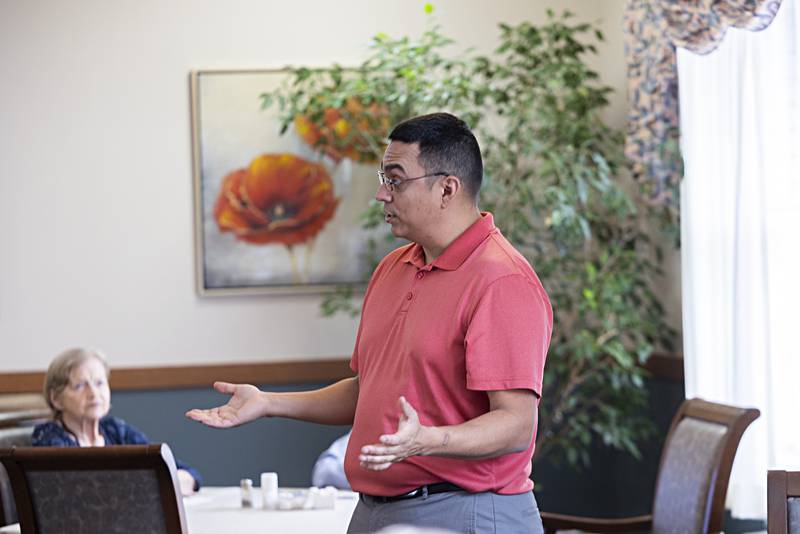 Former Dixon mayor Li Arellano speaks to residents at Liberty Court Thursday, Nov. 16, 2023 in Dixon. Arellano is running for state senate and wanted to stop by and muster support from the residents.