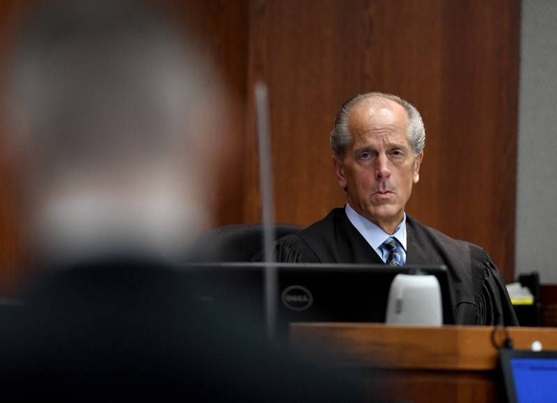 Brett Herold stands and listens as Judge Michael E. Coppedge sentences Herold to 180 days in jail and four years probation on Friday, Feb. 18, 2022, at the McHenry County courthouse in Woodstock. Herold pleaded guilty in October to driving under the influence and failing to report a fatal crash.